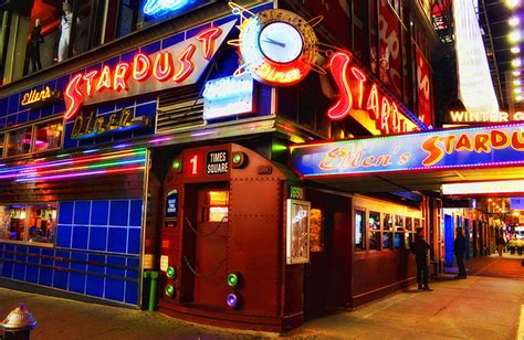 Stardust diner new york - Ellen’s Stardust Diner. The name itself evokes a sort of 1950s glamor—and that’s the point of the place. It stands, in all its neon-sign glory, on the corner of Broadway and West 51 st ...